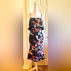 Form fitted party dress. Size 6.  Over all length from top of bust is 40”.